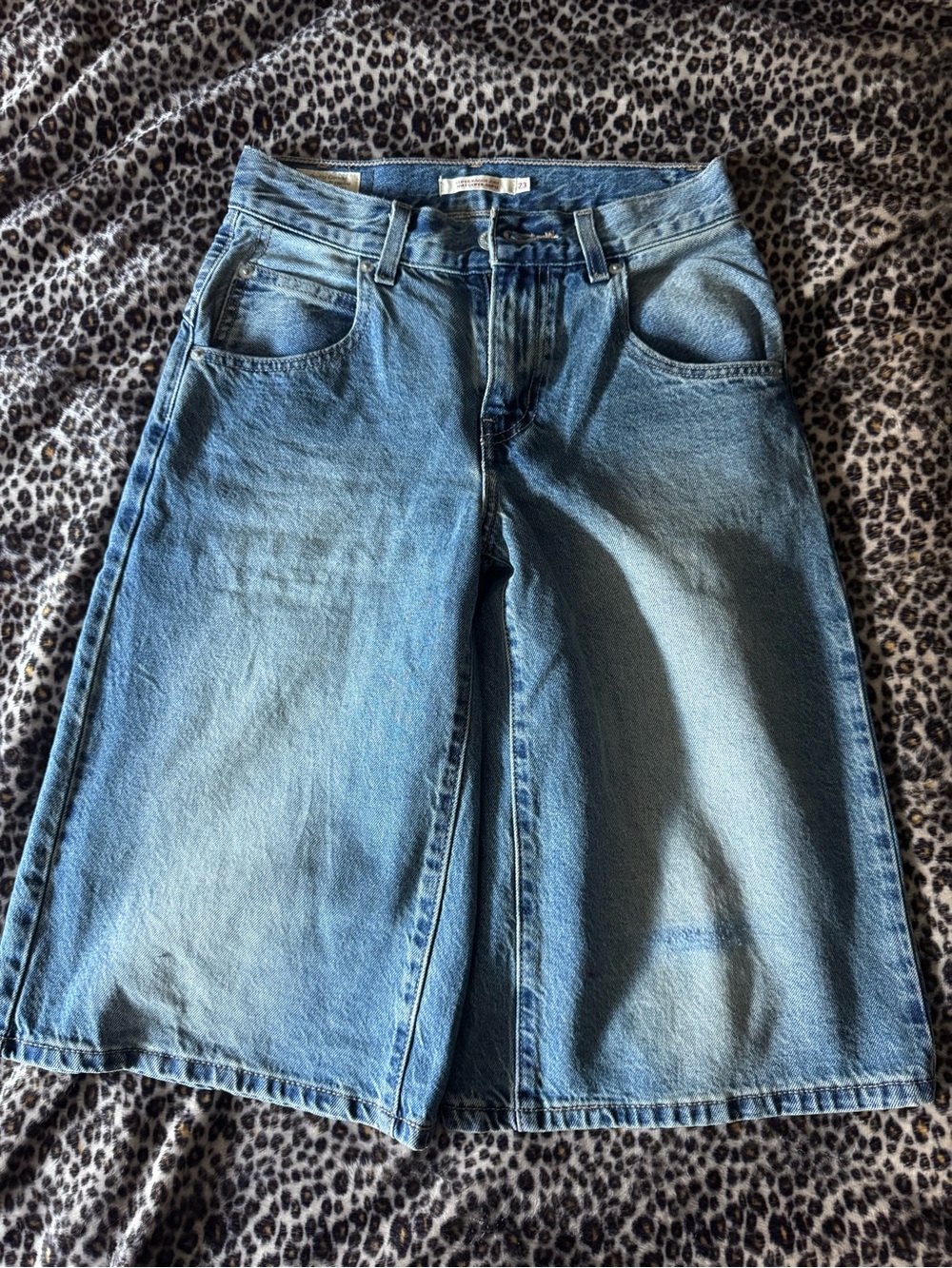 Levi's Light Blue Wide-Leg Denim Shorts with tiny red stain and some distressing